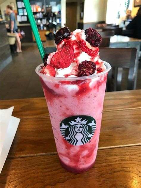 "Magical sweet potato blended with milk, ice and real sweet potato chunks, then topped with. . Vanilla bean frap with strawberry puree